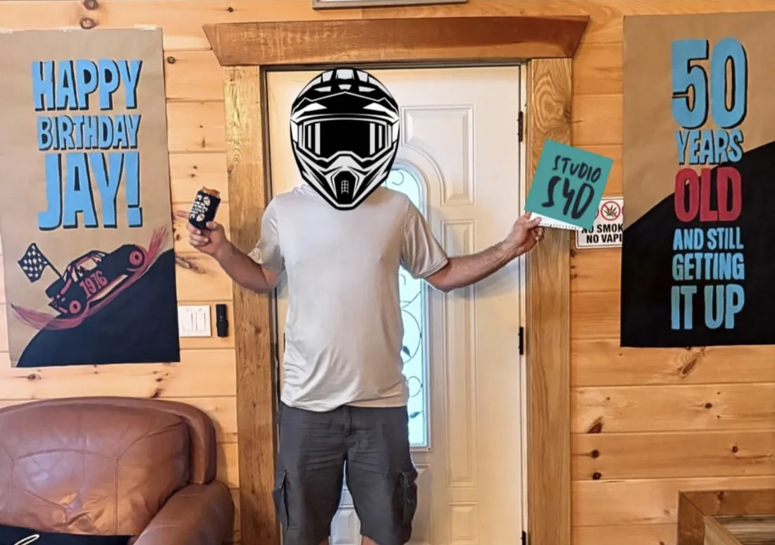 Jay with his 50th birthday banner at the party