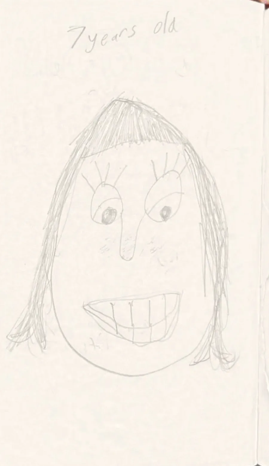 A childhood self portrait drawn at seven years old